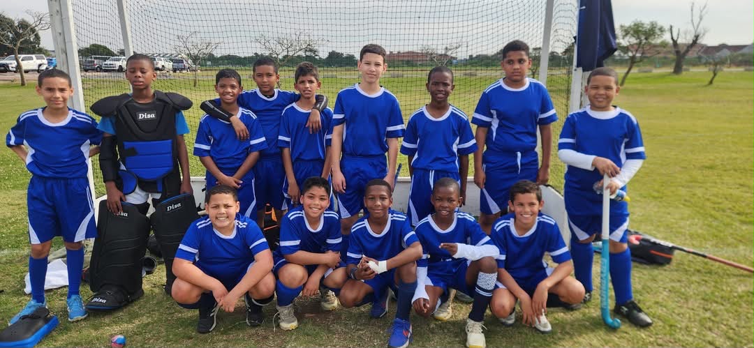 Youth cricket team in blue jerseys — Wezzeuro sports sponsorship